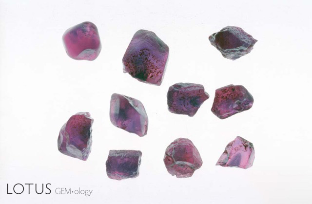 Figure 8. Ninth-century technique for heating Möng Hsu ruby from Myanmar before (left) and after (right) low temperature heat treatment. The process used is just as described by al-Bīrūnī. The stones were heated in air to 1100°C for 20 hours. Clearly this process has greatly increased the value of these rubies by simply reducing the concentration of Fe2+–Ti4+ pairs by a few ppma, thus removing the blue colour zones. Photos: John L. Emmett. Heat treatment of ruby was not the only gem enhancement mentioned by al-Bīrūnī. He also gave an extremely detailed description of pearl treatments and imitations (Sersen, 1991).
