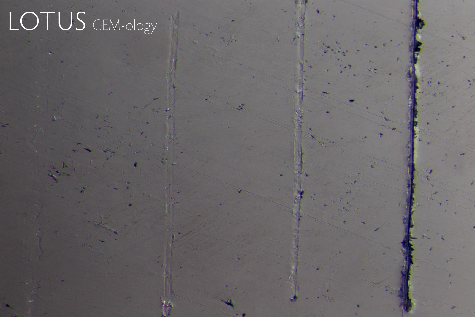Figure 11. Photomicrographs of Mohs scratch testing: The samples were tested using Mohs pencils 5, 6, 7 and 8 (left to right). Note that some of the marks are very faint in the images because the samples were not scratched by some of the Mohs hardness pencils. Photos by author.