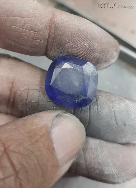 HT+P treated sapphire just after removal from the crucible. Note the soft graphite crust on the surface.