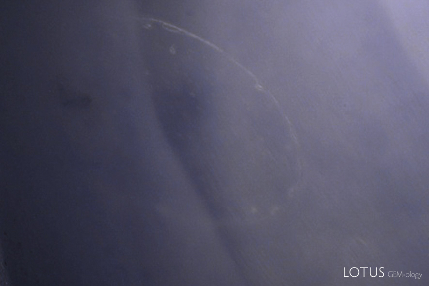 Pressure-heated sapphire before (left) and after (right) treatment. In this case, the treatment produced a slight improvement in clarity due to the healing of a fissure.