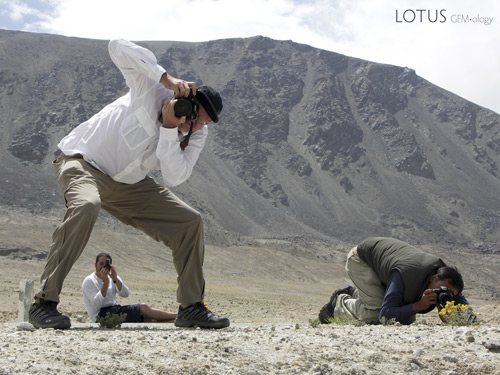 Photomaniacs Richard Hughes, Guillaume Soubiraa and Surat Toimastov gettin' some along the Pamir Highway. Photo &copy; Vincent Pardieu