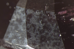 This Mozambique ruby was heated after it was cut and not repolished, leaving evidence of the treatment on is surfaces.