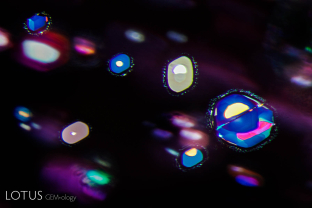 Thin film inclusions in the basal plane of a Thai/Cambodian ruby.