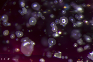 These thin films on the basal plane indicate the origin of this Thai/Cambodian ruby.